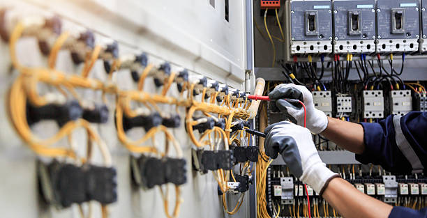 Professional Electrician technician working in Mansfield Center, MA